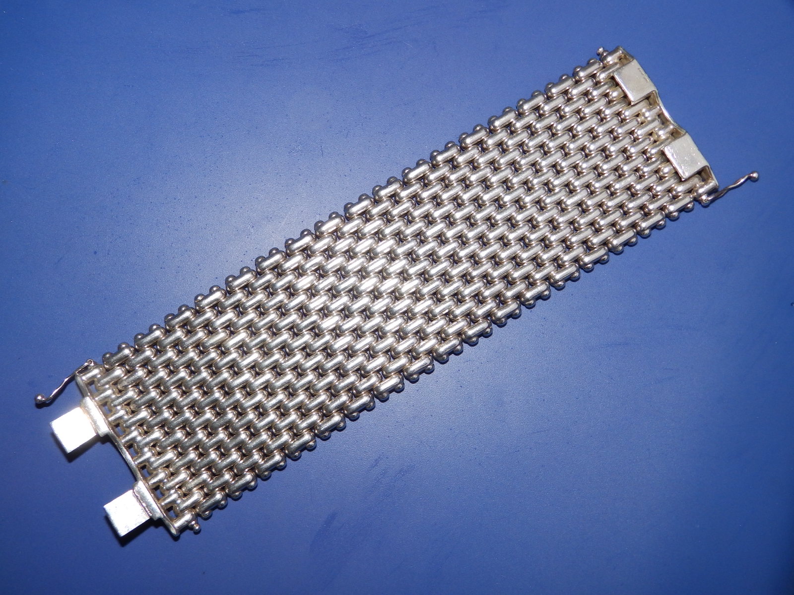 A Tiffany & Co. extra wide silver bracelet with double fasteners, London import marks, 7.5" x 2.2"