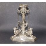 An EP candlestick cast with griffins on triform base, 7" high.