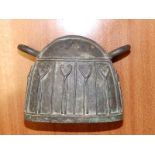 A bronze bell in Benin style, 5" across.