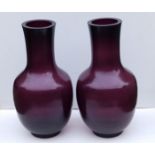 A pair of Chinese Qing Dynasty amethyst coloured Peking glass bottle vases, 14.5" high.