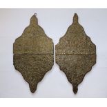 A pair of antique Eastern brass faced hinged wooden plaques, 29.5" overall.