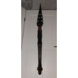An old New Guinea ceremonial paddle, 56".
