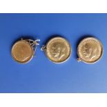 Two gold sovereigns - 1913 & 1915, together with an 1896 half sovereign - all in detachable gold
