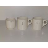 Two white glazed Newhall railway mugs - 'GWR' and one other 'BRR'. (3)