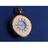 A gold plated half hunter pocket watch by Tavannes Watch Co. in Dennison case.