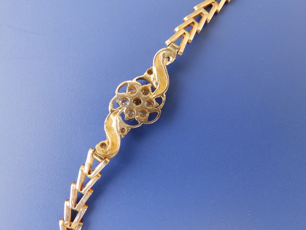 A yellow metal bracelet set with a diamond daisy cluster - tests as 18ct, 6.6" - Image 3 of 3