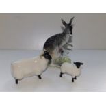 A Beswick ewe with lamb and a model of a kangaroo with joey - drilled hole through base, 6". (3)