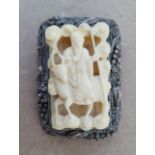 An early 20thC Chinese 'Sterling' silver mounted carved ivory brooch of rectangular plan, 1.75"