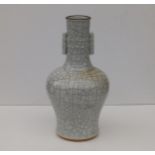 An old Chinese crackle glaze vase in Song Dynasty style, the narrow neck having a pair of upright