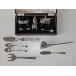 A modern cased Birmingham silver condiment set, two cased silver tea spoons, a Victorian silver