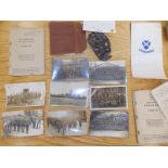 Eight WWI photographic postcards depicting army units, three WWII army release books and a piece