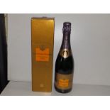 A bottle of 1996 Veuve Cliequot Ponsardian Champagne Vintage Reserve in presentation box.