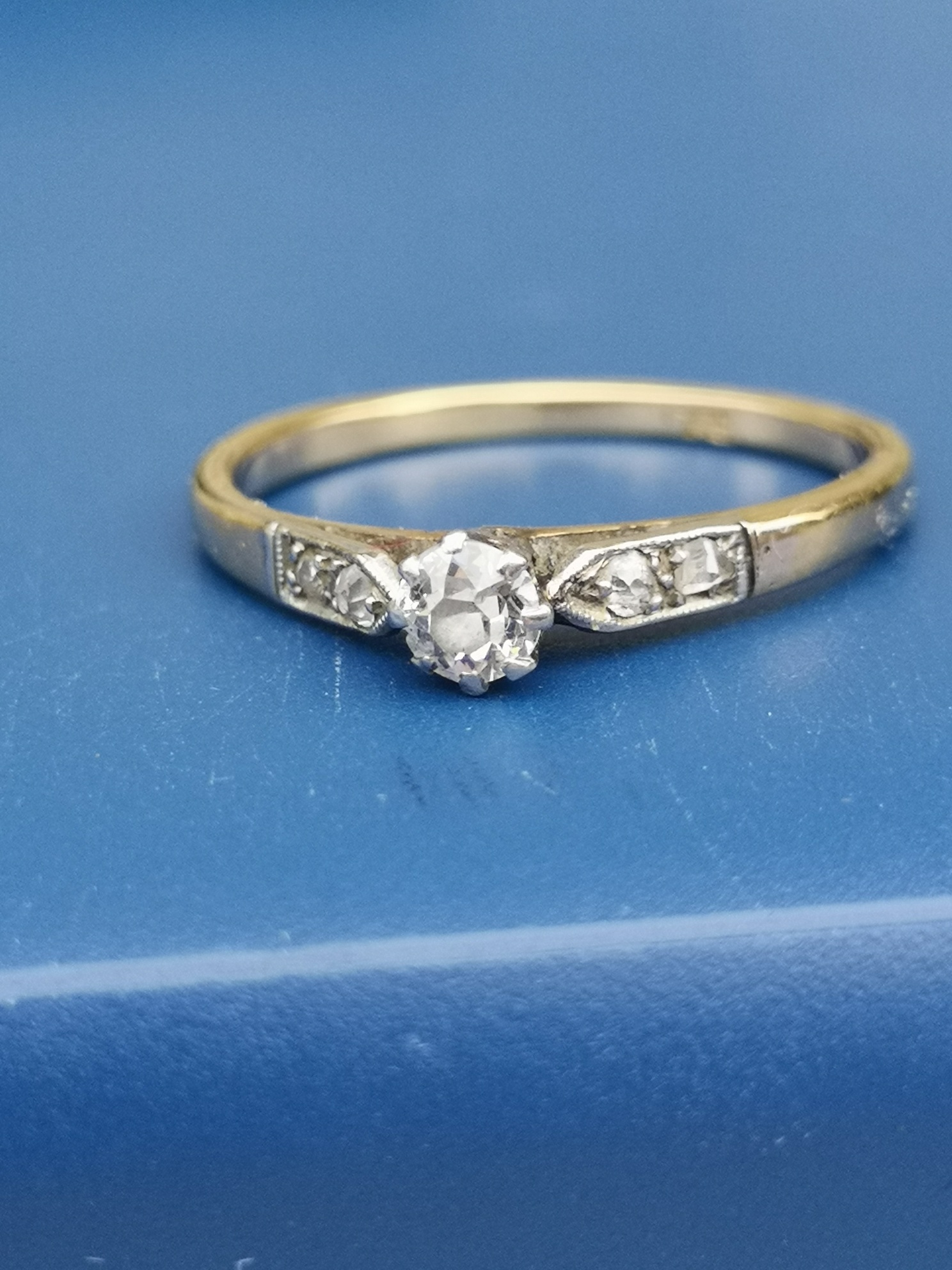 A small old cut diamond solitaire ring on 18ct gold shank. Finger size P.