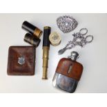 A plated hip flask, a pair of French silver grape scissors, a small telescope and three other items.