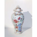 An 18thC Chinese famille rose porcelain Meiping vase with domed cover, decorated with a flowering