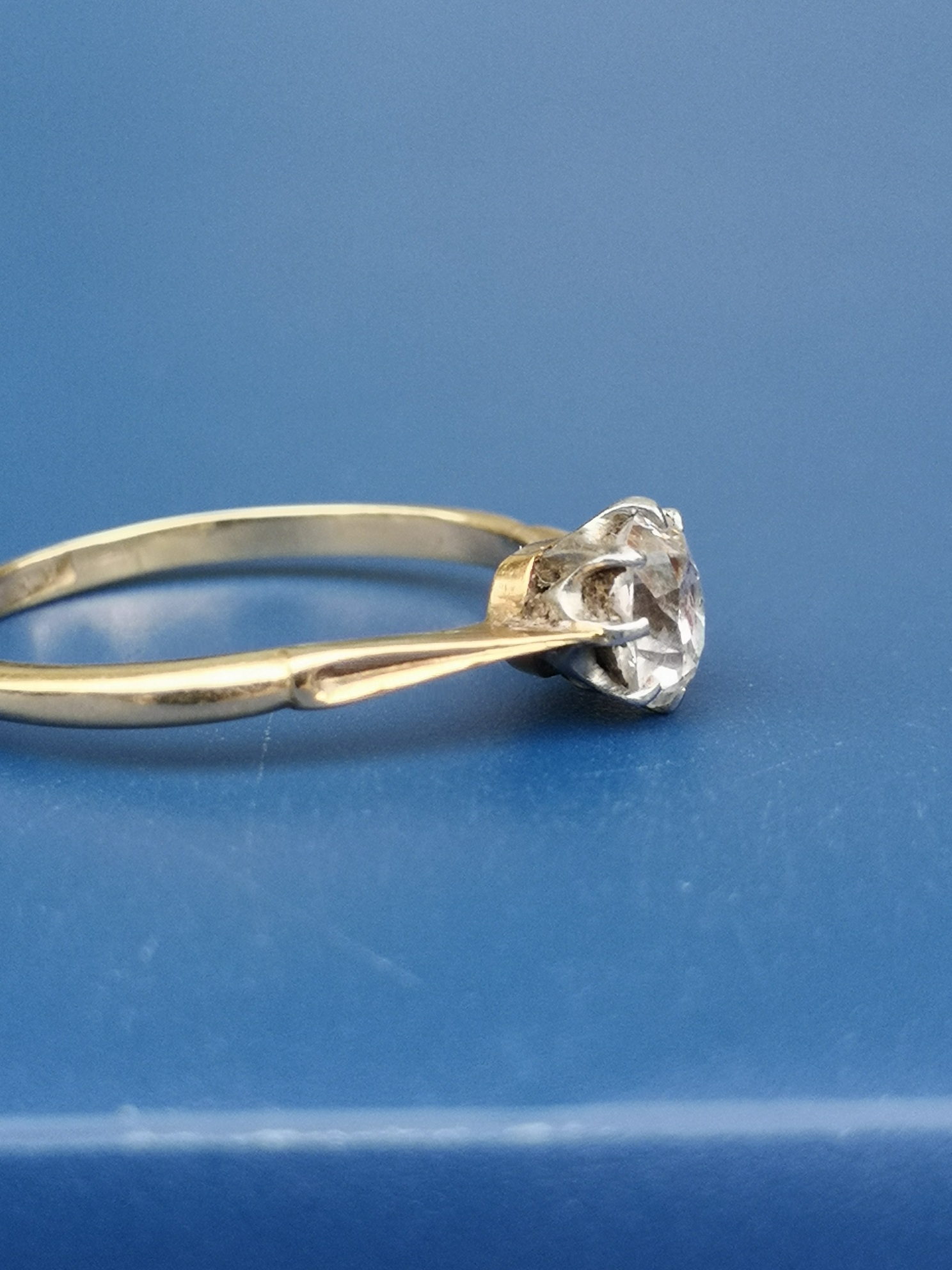 An old cushion cut diamond solitaire ring, the claw set stone weighing approximately 0.60 carat, - Image 2 of 2