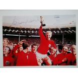 1966 WORLD CUP PHOTOGRAPH AUTOGRAPHED BY BOBBY MOORE