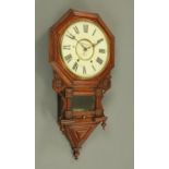 A Victorian American regulator wall clock, with two-train movement marked "F.W.