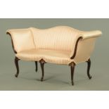 A Victorian boudoir settee, with humpback, scroll over arm rests, part mahogany showframe,