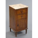 A marble topped bedside chest, with two drawers and pot cupboard, raised on turned wooden legs.