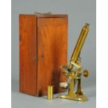 A Victorian mahogany cased brass microscope, signed E Wheeler London, case height 42 cm.