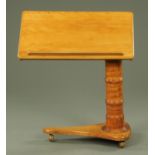 A Victorian satin birch adjustable reading table,