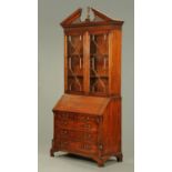 A George III style mahogany bureau bookcase, in the Chippendale manner,