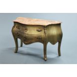 A gilt painted commode chest,