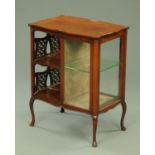 A mahogany low display cabinet,