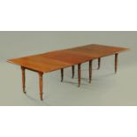 A Regency mahogany Campaign dining table,