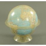 A mid 20th century National Geographic terrestrial globe, on stand. Globe diameter +/- 20 cm.