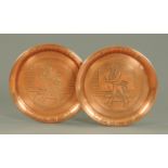 A pair of Johnnie Walker copper pub trays. Diameter 33 cm.