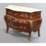 A marble topped four drawer commode chest, with cream and grey variegated marble top,