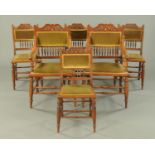 A set of six Edwardian mahogany dining chairs, comprising two arm and four single,