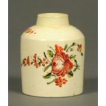 A creamware tea caddy, decorated with floral bouquet and sprigs (lid lacking). Length 10 cm.