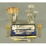 A four flute silver plated epergne, a silver plated champagne bucket,