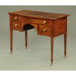 An Edwardian foliate marquetry serpentine fronted dressing table,