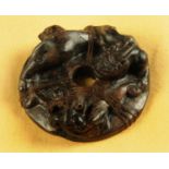 A Chinese brown jade circular disc,