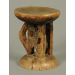 An Ashanti type tribal stool. Diameter 22 cm.