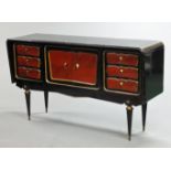 A 1930's inspired ebonised sideboard, with four cupboard doors with contrasting gilt trim,