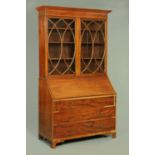 A George II mahogany bureau bookcase,