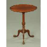 A George III style mahogany tripod table,