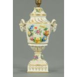 A Dresden porcelain lamp base, with floral encrustations,