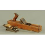 A 19th century James Howarth rabbet plane and a box smoothing plane.