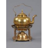 A late 19th century brass kettle, with stand and burner, in the Arts and Crafts style.