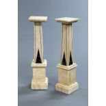 A near pair of marble stands, with cream bodies with contrasting green marble inlays.