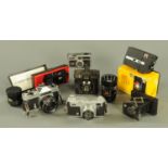 A vintage Russian camera, a Chinon camera, two Kodak Instamatics and various other cameras, lenses,