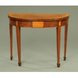 A George III mahogany satinwood crossbanded turnover top games table,