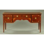 A George III inlaid mahogany sideboard,