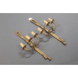 A pair of three branch gilt light fittings. Length 60 cm (411).